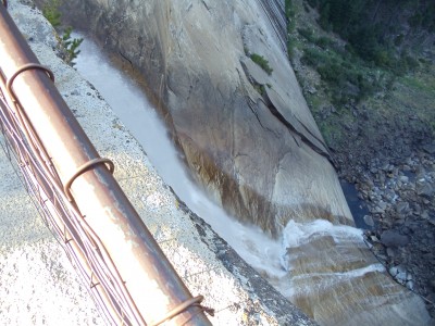 Nevada Falls, from the precipice, looking down over a guard rail at the water crashing down