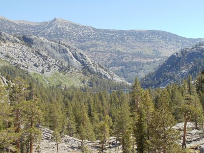 Shadow Lake is surrounded by mountains, except for its outlet near a notch